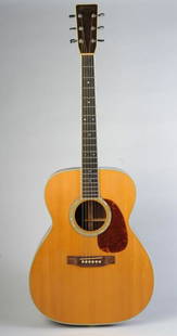 1978 Martin M-38 Acoustic Guitar: Serial number 404996. Some minor wear but no visible cracks or repairs. Martin & Co. logo to headstock, tuning machines marked Made in Germany. With hard carrying case.