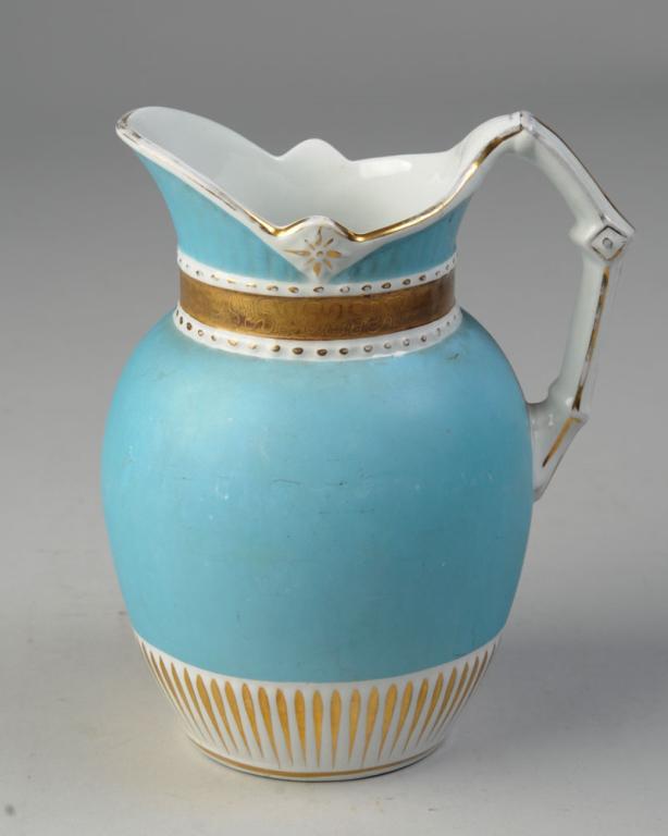 Johnson Brothers Royal Ironstone Pitcher: Hand painted with gilt decorations and no visible chips, cracks or repairs. Some discoloration, fading to gilt. Marked to base. H: approx. 7".