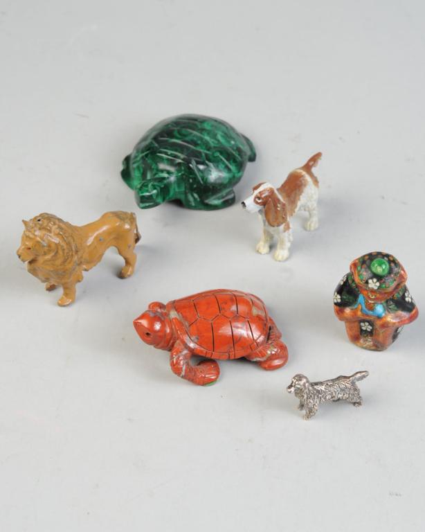 Miniature Animals: To include a sterling silver spaniel, a painted cast metal spaniel, an English cast metal or lea lion, two carved stone turtles, and a Chinese ginbari cloisonne monkey. Largest turtle, approx. 3 1/4" 