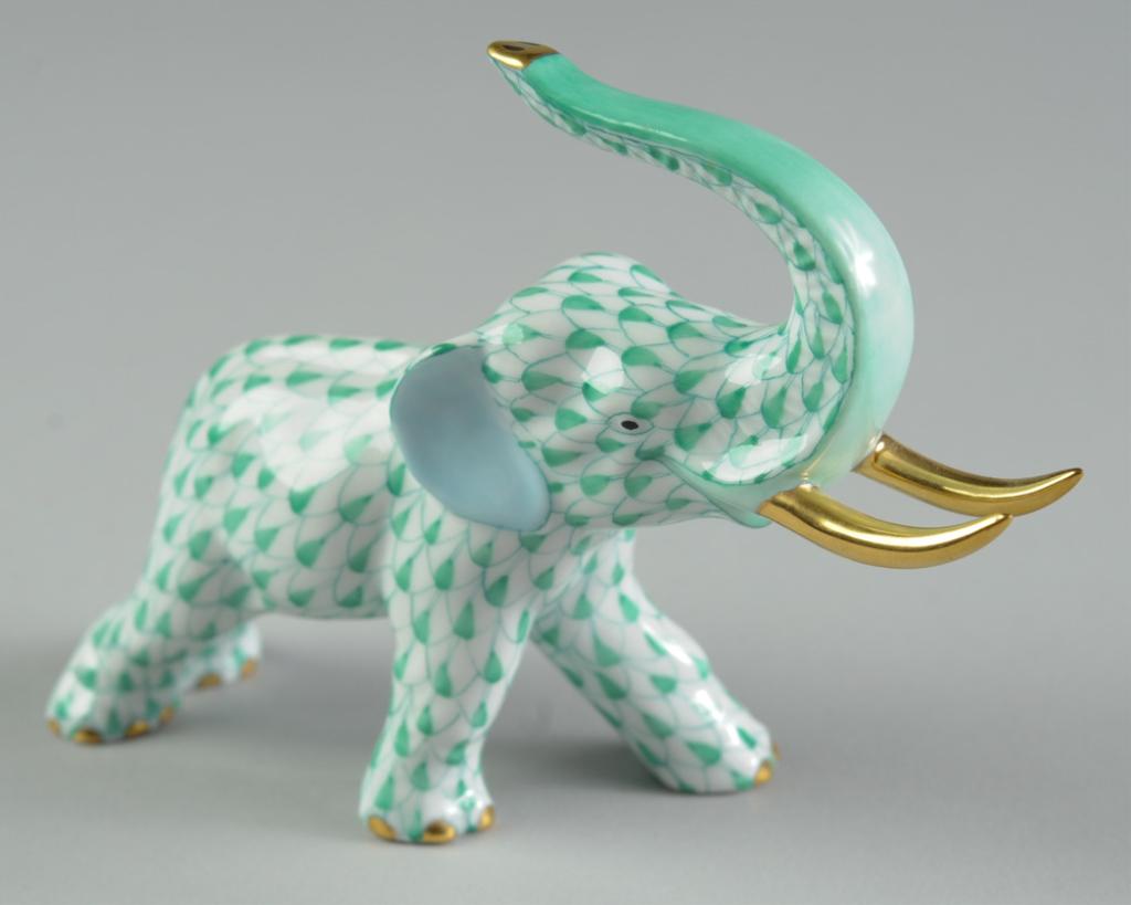 Herend Green Fishnet Elephant Figure: Herend porcelain elephant, fully marked to feet. Excellent condition. Approx. 5 1/2" from tip of gold tusk to heel of hind foot.