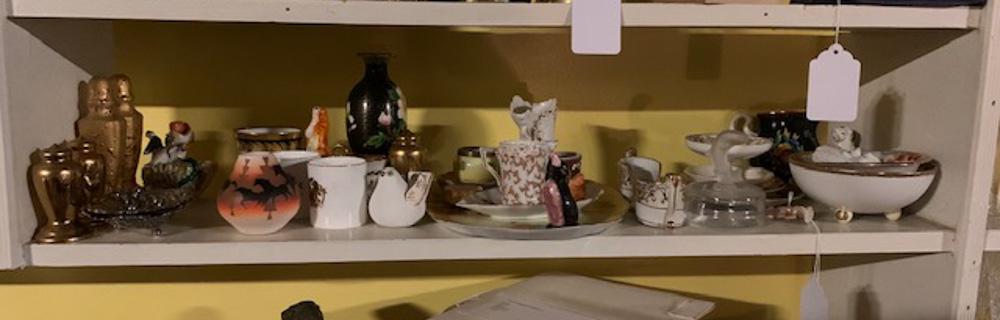 Mixed Lot: Including Wade porcelain Monkey figurine, Mexican pottery Dove, French glass Dolphin dish, cloisonne vase, Staffordshire style figures (damaged), etc. In as-found condition.