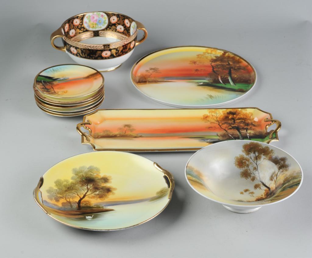 Lot Hand-Painted Japanese Porcelain: Mixed lot of hand painted vintage Noritake porcelain including 7 small (6 1/8" - 6 1/2") plates, oblong rectangular tray (17" x 7",) 8 1/2" diameter bowl, 10 1/2" round serving platter, 12" round char