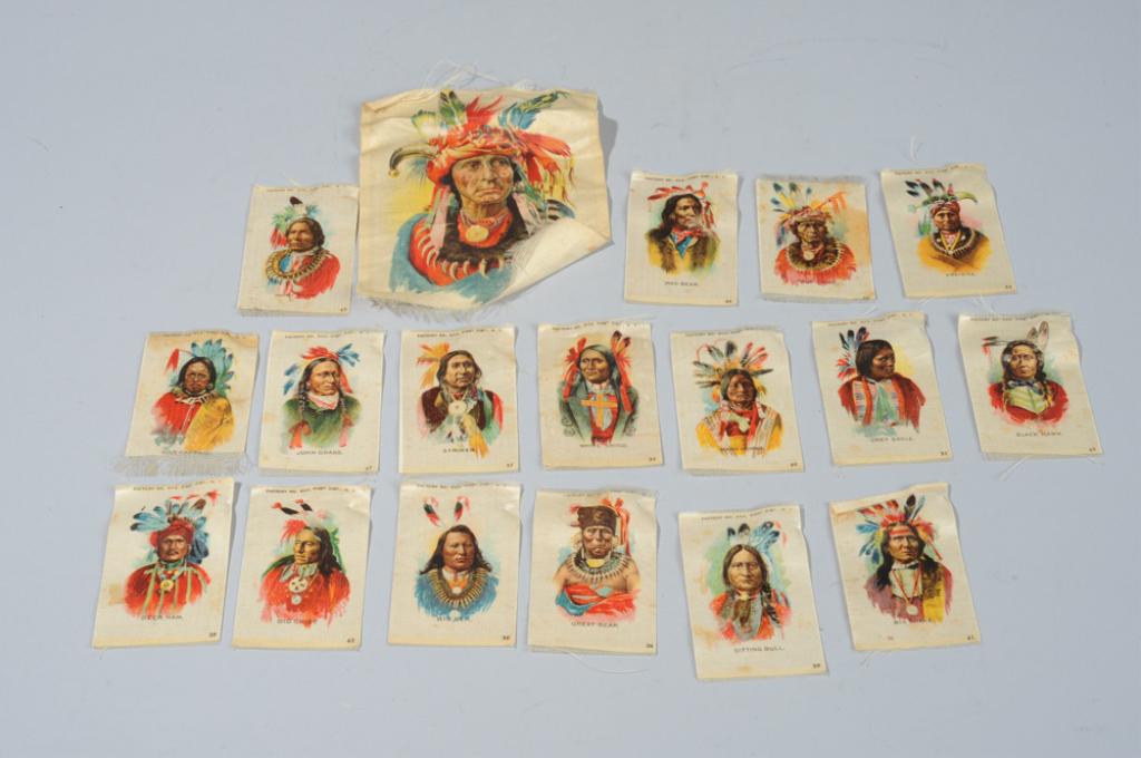 18 Tokio Cigarettes American Indian Silks: Including Sitting Bull, Big Chief, White Shield, John Grass, etc., some discoloration and tears, all in as-found condition. Most are approx,. 3" x 2".