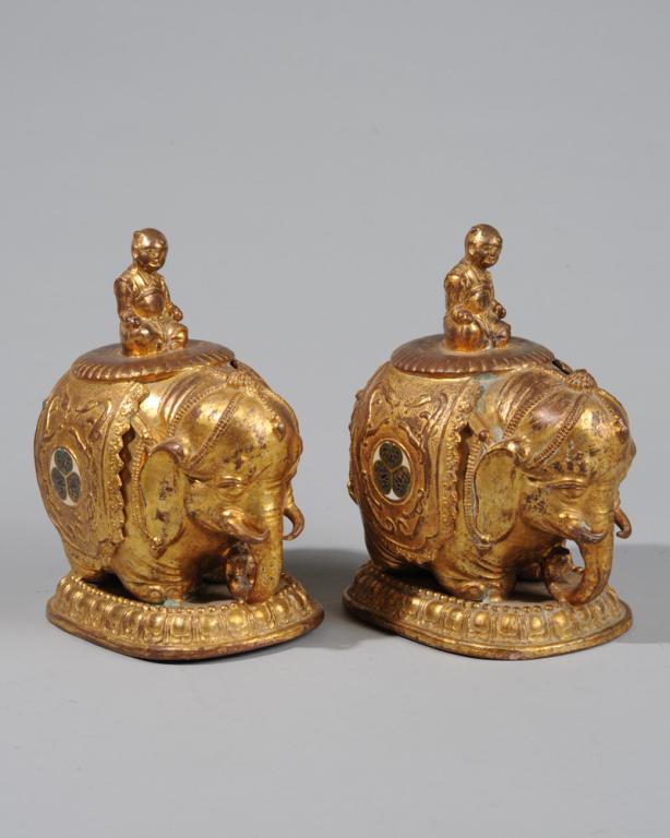 Pair Chinese Style Gilt Bronze Elephant Figures: Well-appointed elephants with little boys as riders, with inset cloisonne roundels flanked by dragons in relief and each standing upon a half-lotus base. Both marked "Made in Japan" to underside. Prob