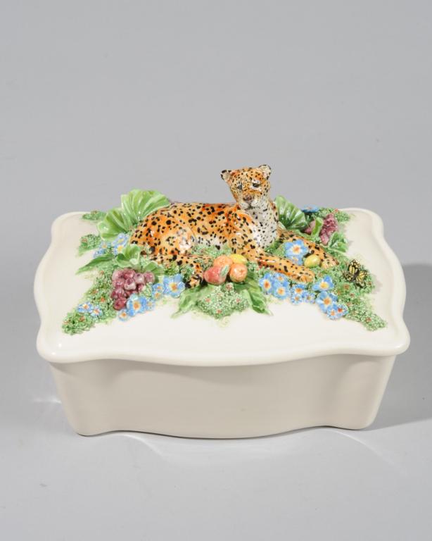Susan Kimmel (20th / 21st C.) Ceramic Leopard Box: Ceramic lidded box with reclining Leopard to lid by Maryland-based artist Susan Kimmel, with minor chips / in as-found condition. H: approx. 5 1/4". W: approx. 7 3/4". D: approx. 5 3/4".