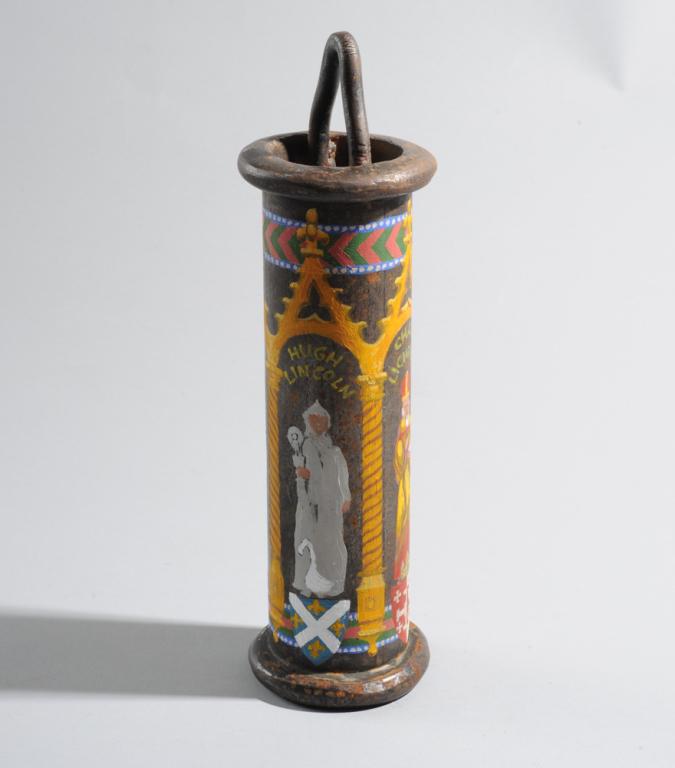 Folk or Trench Art English Cathedrals Object: Fashioned from a heavy metal cylinder with welded-on handle, with brightly painted gothic arches enclosing figures of St. Hugh, St. Chad, and St. Richard, with the names of their respective cathedrals