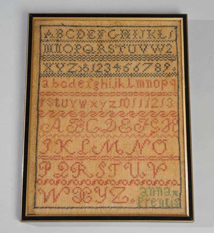 19th C. Needlework Sampler: By Anna M. Prentis, probably when a young girl. Undated, but we have two hand drawn maps by Miss Prentis dated 1856.The sampler shows plain and fancy alphabets and numerals 1-9, with various borders a