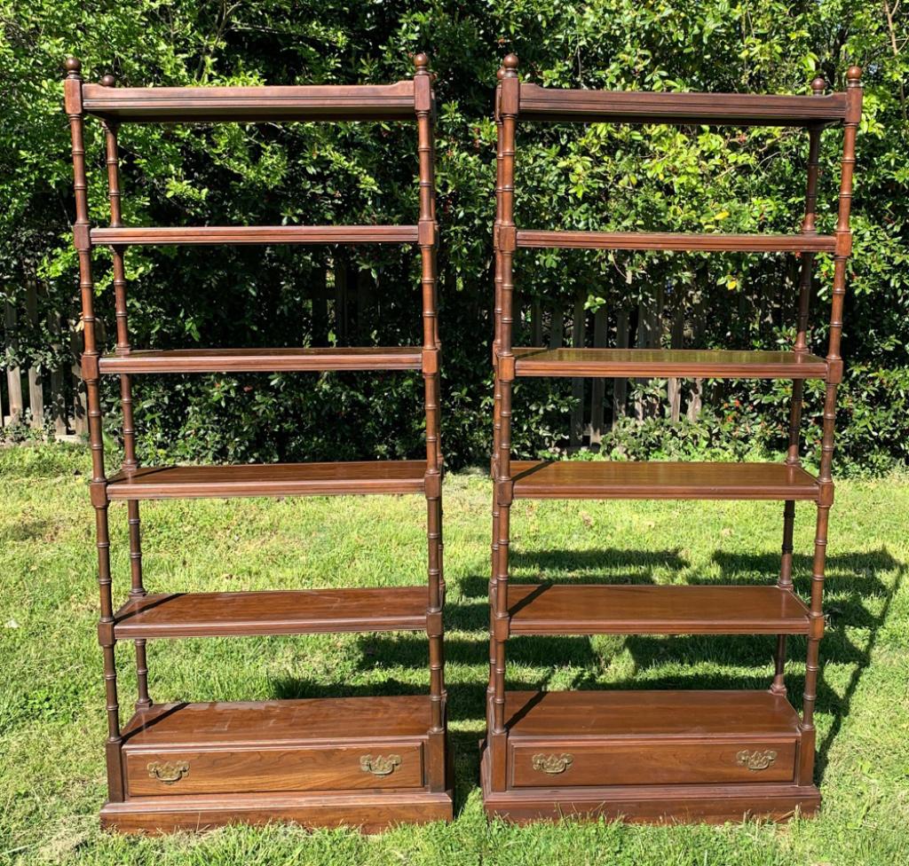 Pair Ethan Allen Georgian Court Shelves: Faux bamboo supports, with bottom dovetailed drawer with brass pulls. H: approx. 80". W: approx. 36". D: approx. 13".