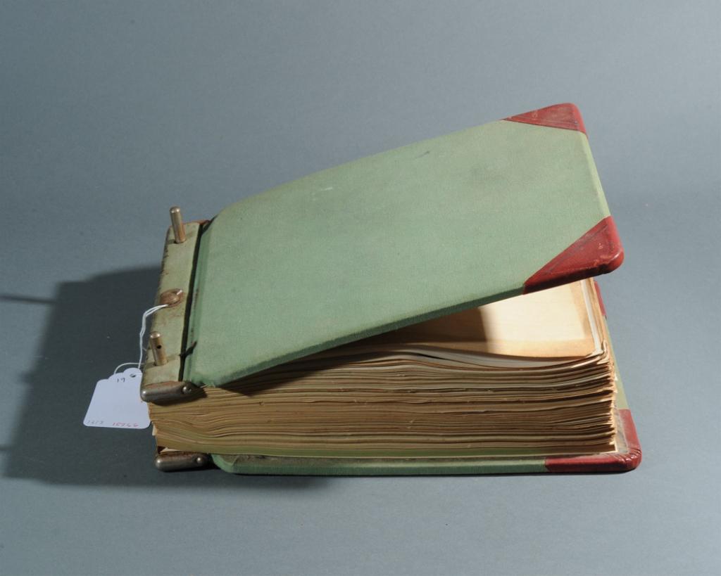 1950s Richmond, VA Photo Album: Most photos dated 1953 or 1954, many photos of John Marshall High School sporting events and classrooms, some military and airplane photos, some car wreck photos.