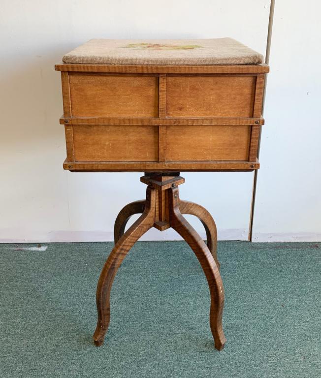 Unusual Tiger Maple Sewing Stand: Needlepoint lift-lid. H: approx. 31". W: approx. 17". D: approx. 17".