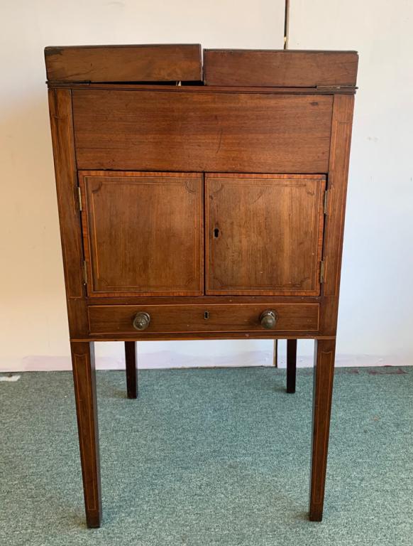 Early 19th C. Georgian Dressing Table: String inlay, tapered legs, the two section folding top opens to reveal a hinged glass tray (missing pull tabs). When open it reveals a lined space for jewelry, all of which is over a compartment with