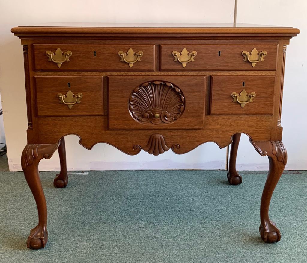 Biggs Chippendale Style Lowboy: Cherry, stamped Biggs to interior of drawer, carved shell motif, 1/4 ribbed columns to side, ball and claw feet, 2 drawers over 3 drawers. H: approx. 32 1/2". W: approx. 38". D: approx. 23".