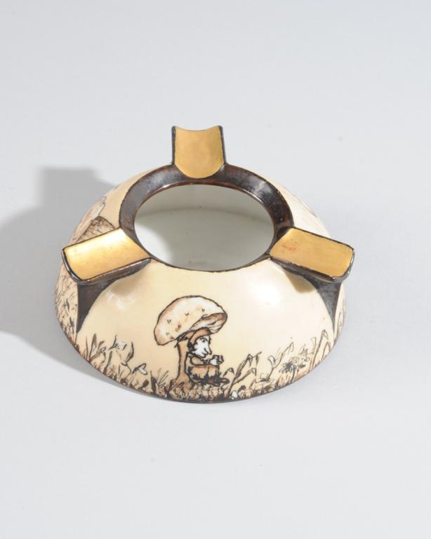 RS Prussia Ashtray: Unusual painted design with pixies and mushrooms, signed by the artist Carrie Colt and inscribed to the recipient. H: approx. 2". Dia: approx. 4".