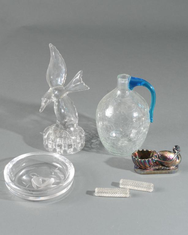 Glass Lot: Including an Art Deco etched glass bowl with nude, a crystal flower frog featuring a Bird, a crackle glass jug, a pair of glass knife rests, and a figural Turkey Carnival glass toothpick holder.
