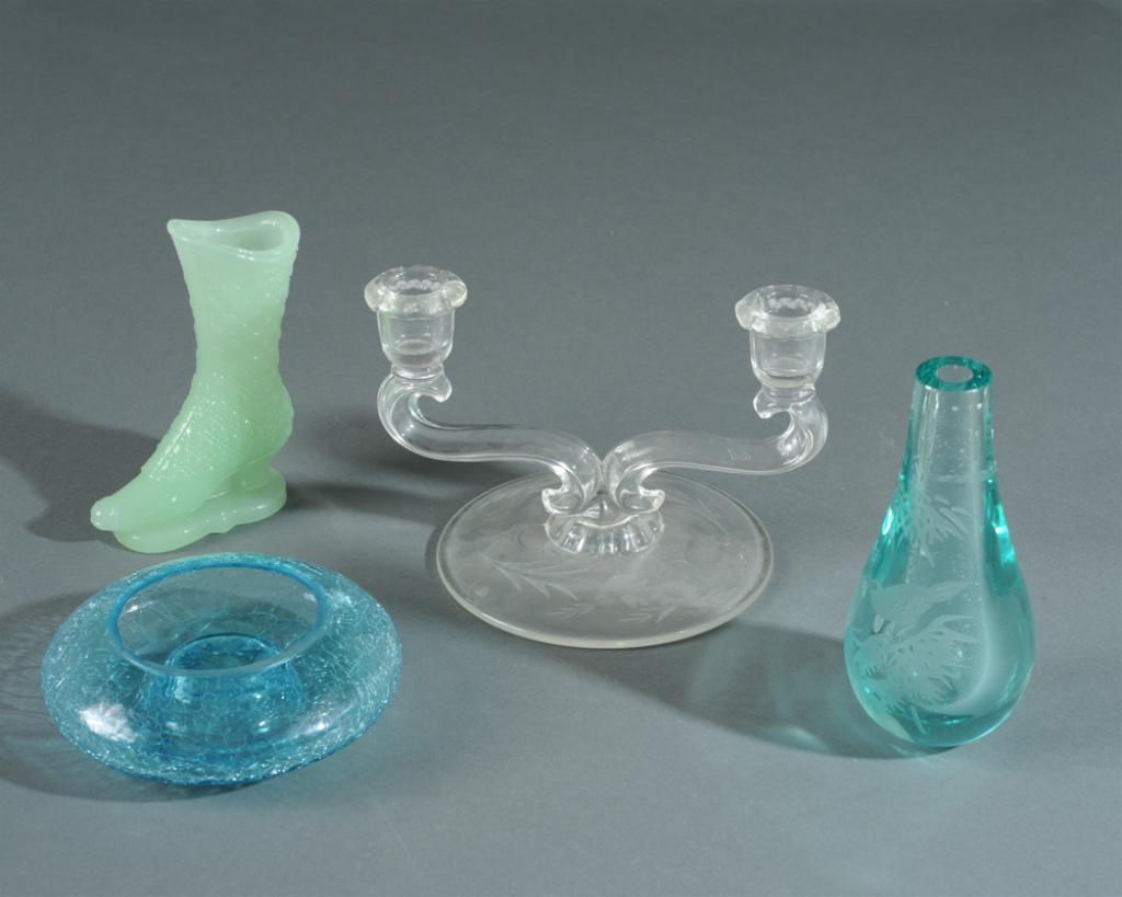 Glass Lot: To include a crackle glass candle holder, unusual green Victorian glass boot, an elegant Depression glass double candlestick, and a Japanese etched glass vase. Tallest: approx. 6".