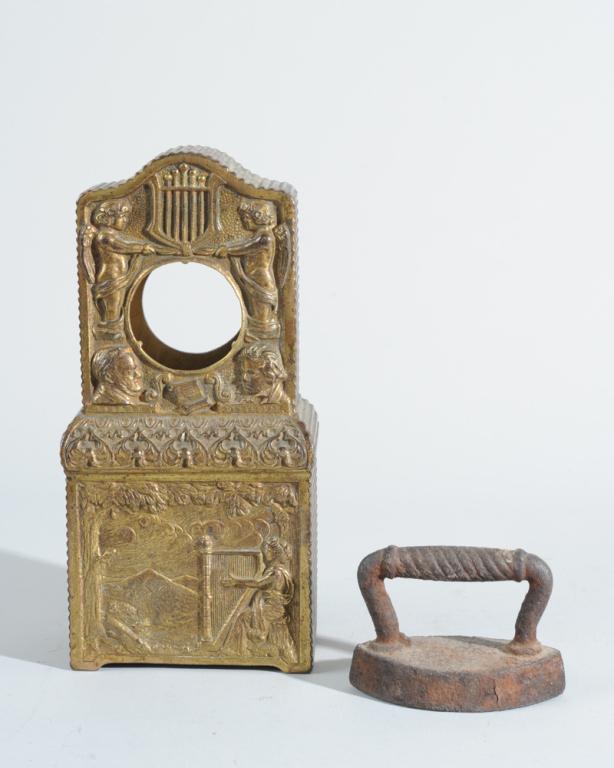 Mixed Lot: Cast brass clock case with relief of Beethoven and Wagner, together with a "Little Iron" with double point and rope handle.