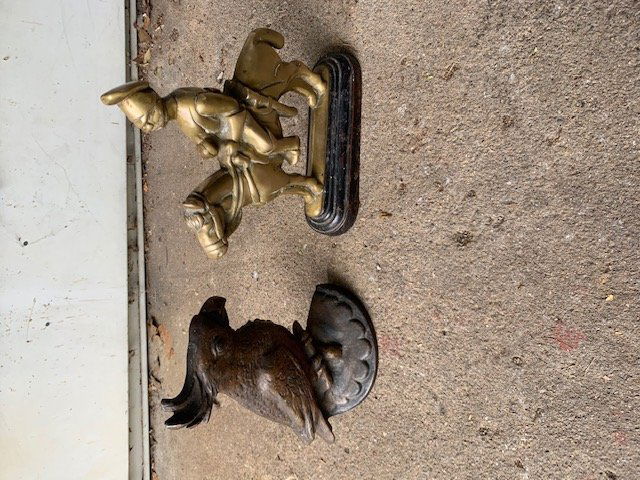 Two Early Brass Doorstops, Cockatoo & Hussar: Cockatoo marked for Creation Co. 1930, Hussar is Victorian England, unmarked. Both in as-found condition. Tallest: approx. 10 1/4".