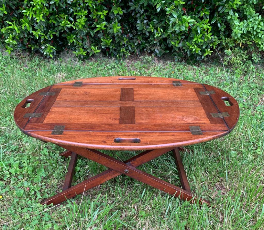 Butler's Tray Table: Drop-leaf top over folding stand, in as-found condition. H: approx. 16 1/2". Top: approx. 19" x 27 1/2" with leaves up.