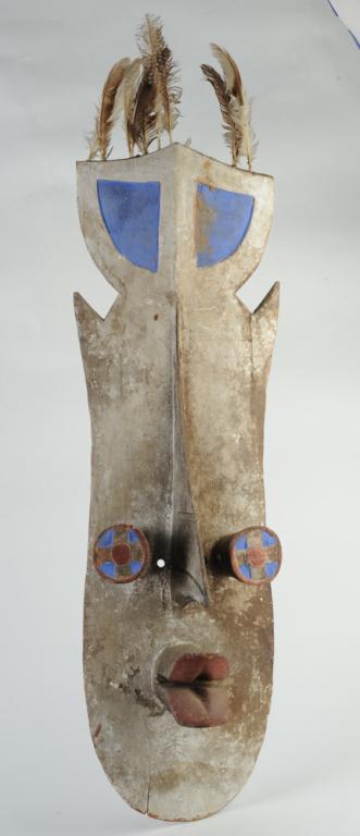 Grebo Mask, African: Large mask, carved wood, pigments, feathers. Grebo people, Liberia. Approx. 37" x 10 1/2". Provenance: Estate of Thomas McNemar, (1931-2019.) McNemar lived and collected throughout Central and West Af