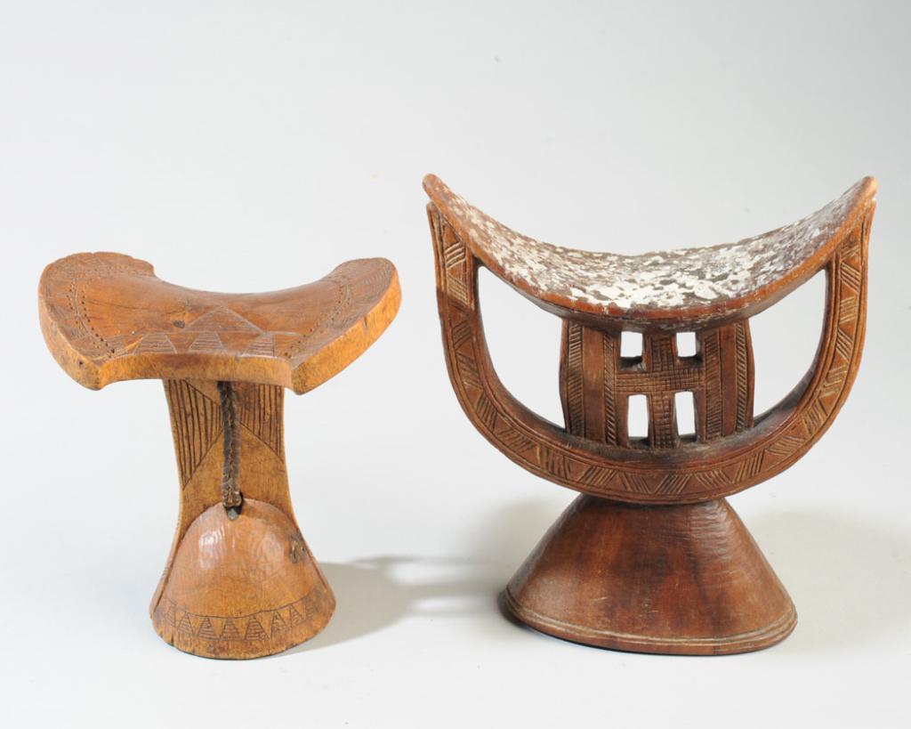 Turkana and Kambaata Headrests, Ethiopia: The larger with U-shaped support bearing crescent shaped neck rest, with openwork cross and incised decoration, attributed to Kambaata people, Ethiopia. The smaller with round base, incised decoration