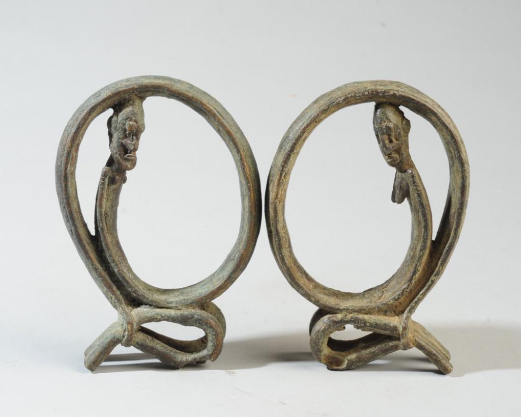 Pair Dogon Bronze Couple Figures: Male and female circle figures, the male with beard, the female with scarification on her breasts, both with incised designs to hoop. Green patina to bronze. Each approx. 5 3/4" in height. Provenance:
