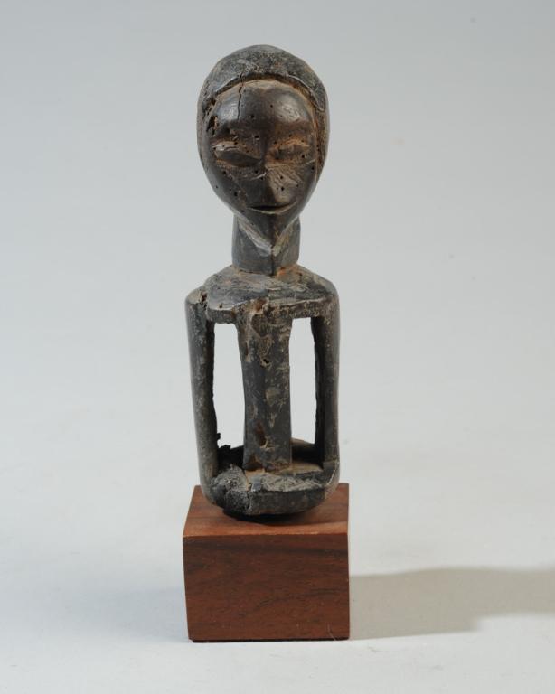 Small Power Half-Figure Kukudji, Congo: Luba or Kusu small wood power type figure, black surface, old insect damage, wear. Mounted to gallery base. Democratic Republic of Congo. Figure, approx. 5 1/2" H. With base, approx. 7". Provenance: E