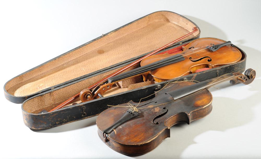 Two Antique Violins: One a reproduction Jacob Steiner with "1713" paper label to interior and "WJ Purvis / 1900" carved into side, with case with bow, the other with no maker's mark and "WC" carved into back, both show da