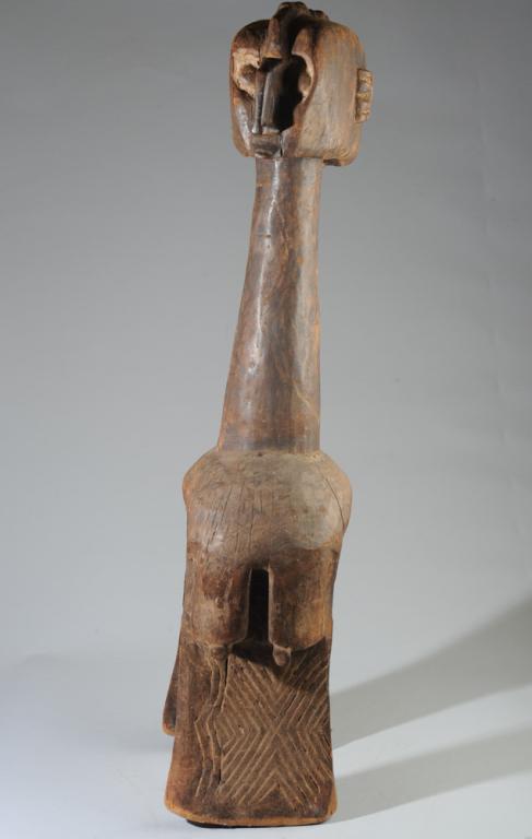 Baga Nimba Shoulder Mask: Fertility shoulder mask in the form of the goddess Nimba. Baga artist. Carved wood, approx. 43" in height.Provenance: Estate of Thomas McNemar, (1931-2020.) McNemar lived and collected throughout Cent
