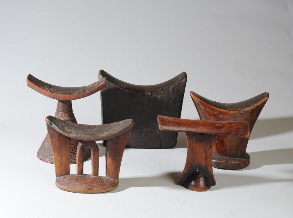 Lot of Five African Headrests: Carved African headrest group, various peoples including Sidamo and Kambala (Ethiopia.) Approx. 5 1/2" - 7" in height. Provenance: Estate of Thomas McNemar, (1931-2020.) McNemar lived and collected th
