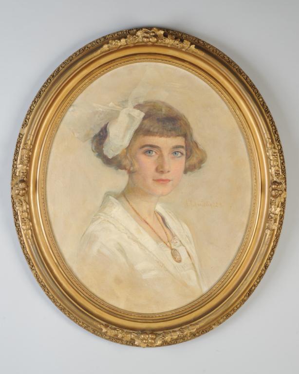 Adolph Schmidlin (1868-1954) Portrait of a Girl: 1923 Oil on canvas portrait of a young girl with a large white bow in her bobbed hair and a gold locket around her neck. Signed center right, "A. Schmidlin 23". Born in Lahr, Schmidlin studied at the