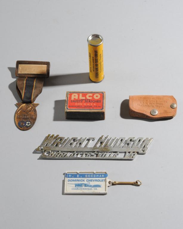 Charlottesville Lot Including Hudson Car Plate: Wright Hudson Charlottesville metal car plate, American Legion 1930s Monticello badge, Citizens Bank dime container, Alco Albemarle-Michie Co. match box, etc.
