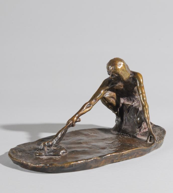 Charles M. Russell Bronze (1864-1926): The Snake Priest, a portrayal of Hopi Chief Lomanakshu prodding a coiled rattlesnake with a whip by Charles Marion Russell. Signed C. M. Russell with skull mark and the date 1914. Marked to side B. Zo