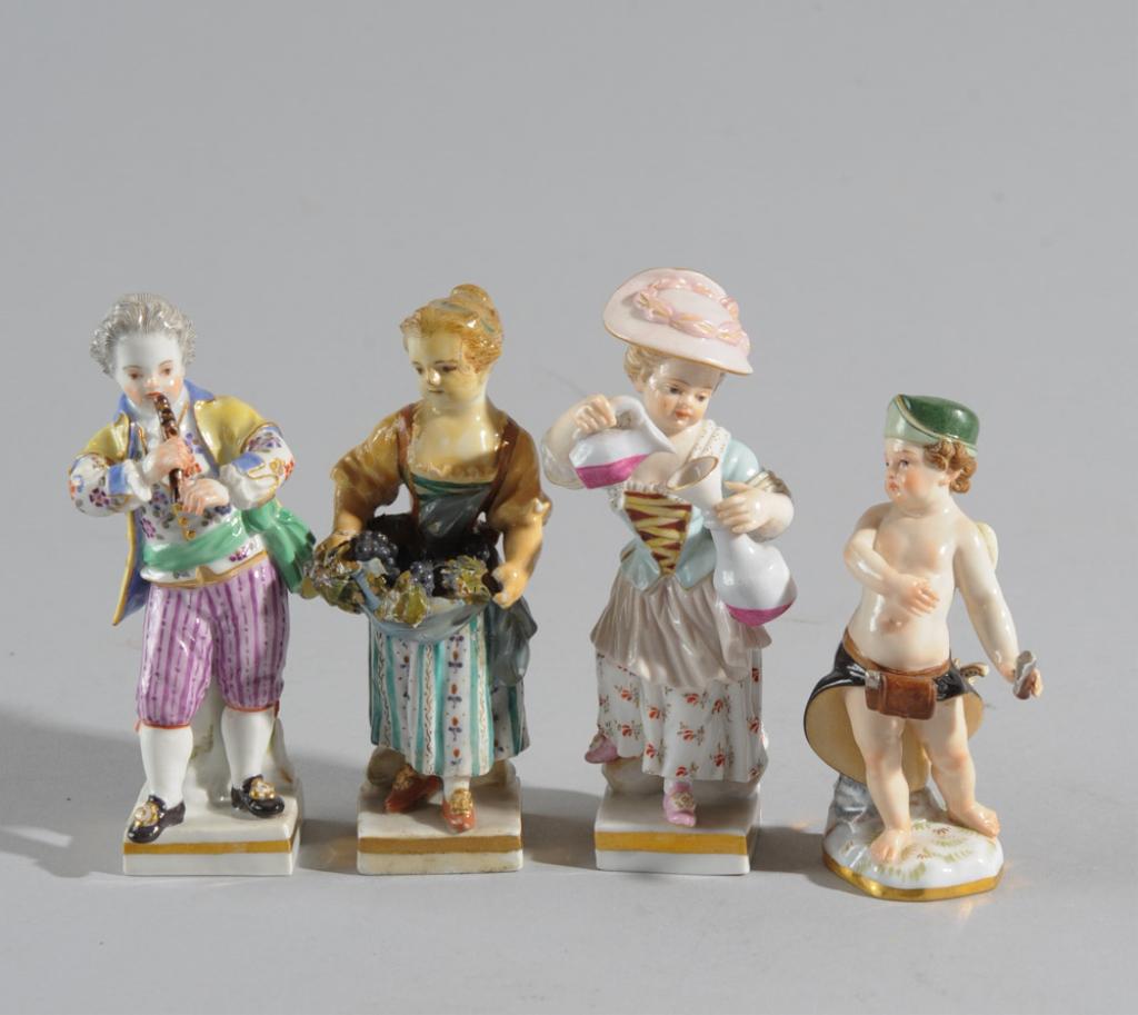 Four Diminutive Meissen Figures: All with crossed swords mark, some numbered.Tallest: approx. 4 1/4".