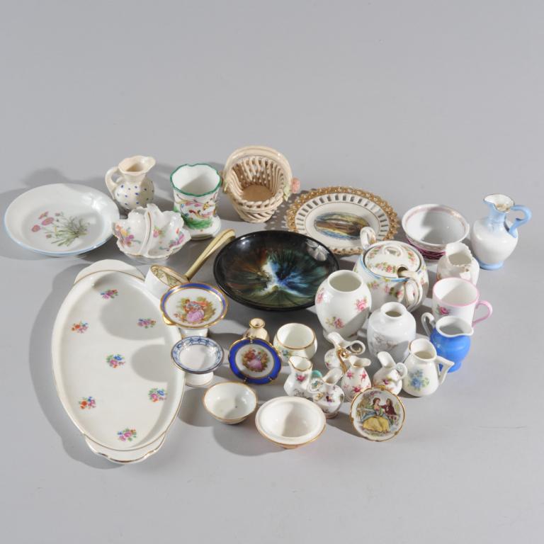 Mixed China Lot: Mainly miniature pieces including Shelley, Continental, Nippon, Limoges, Czech, and other makers. Pitchers, bowls, vases, etc.Tallest: approx. 3".