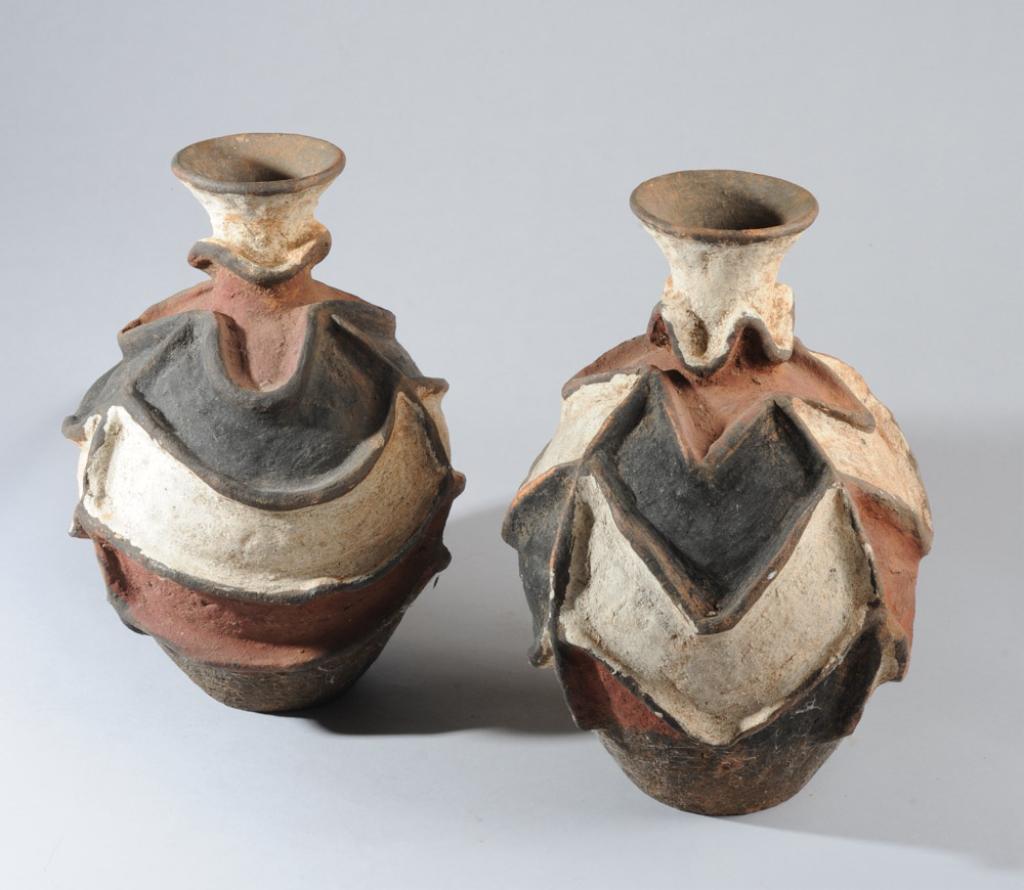 Two Tutsi Pottery Vessels: Water pots with distinctive raised and pigmented decoration. Tutsi people, Rwanda, Burundi. Approx. 16" and 15" in height. Provenance: Estate of Thomas McNemar, (1931-2020.) McNemar lived and collecte