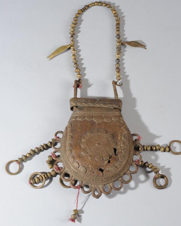 Benin Bronze Purse: Cast bronze container suspended by chain of threaded bronze beads, with fitted cover and with dangling beads and cast bronze objects. West Africa, likely Nigeria. Approx. 17 1/2" total length x 6 1/2"
