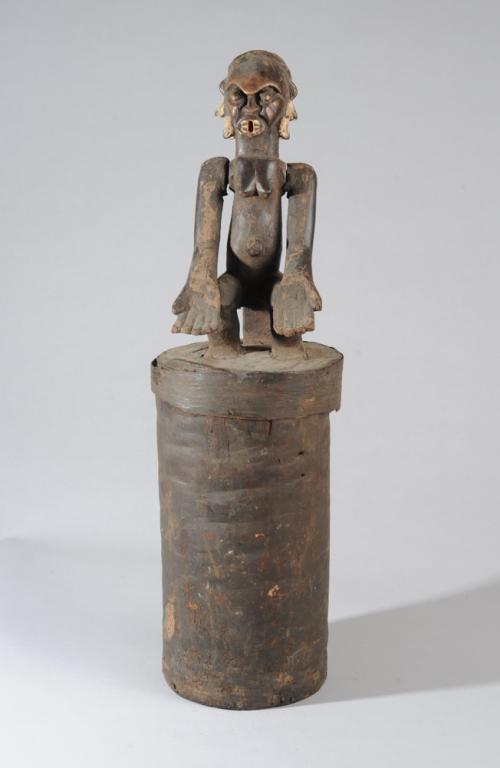 Fang Reliquary Figure & Container, Gabon: Bark reliquary container with seated Fang Bieri Guardian figure affixed to cover. Figures arms are articulated at the shoulders. With the large hands stretched out, palms up, the effect when they are 