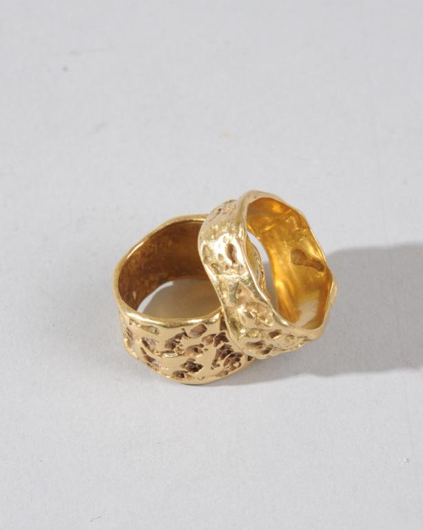Pair 18K Gold Arthur King Modernist Rings: Wedding band pair, though can be worn simply as fine jewelry, by important Modernist jewelry designer Arthur King. The organic forms offer many gleaming surfaces to the light. One slightly larger than
