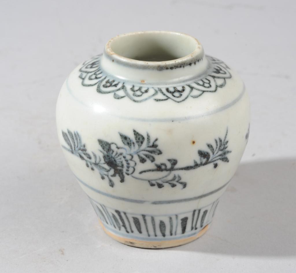 Chinese Yuan Blue & White Jarlet: Jarlet or miniature vase decorated with beautifully painted insects and flowering branches in deep blackish-blue on bluish white, borders at base and rim. Unglazed base revealing very white biscuit. A