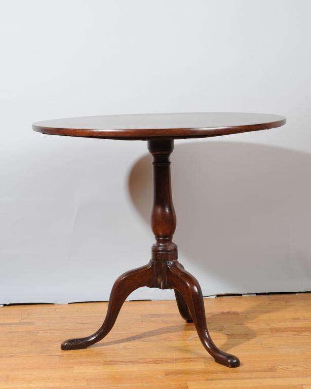 18th C. English Tilt Top Table Cuban Mahogany: Circa 1750 - 1760 English tea table, Cuban Mahogany, tilt top over turned standard on cabriole legs with pad feet.H: approx. 27".Dia: approx. 30 1/2".