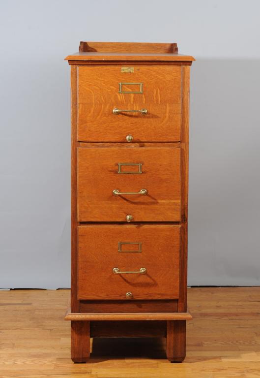 Oak 3-Drawer File Cabinet: Slanted & molded edge top over three dovetailed drawers with brass pulls (top drawer with partial "Resendorf"(?) label), molded edge base over square legs. Originally used at a Shenandoah Valley turke