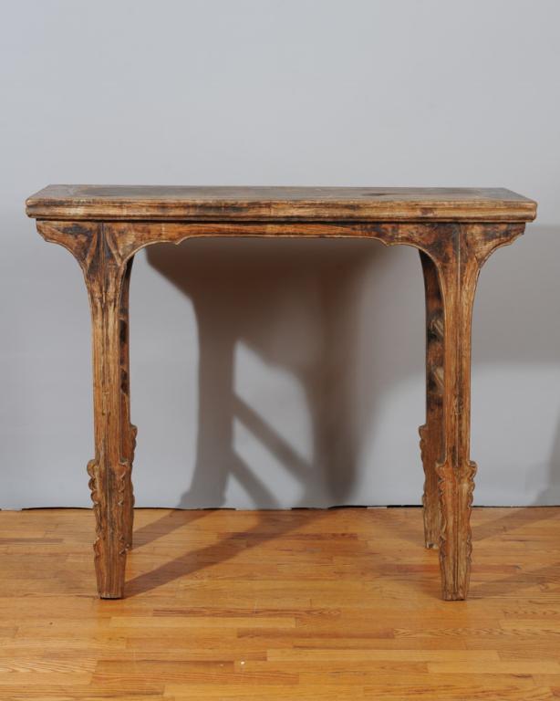 Chinese Altar Table: Long narrow table with shaped spandrels, the square legs with scrolling edges at lower section. Double stretchers at each end. Top with H: approx. 33 1/2"D: approx. 17"W: approx. 42"