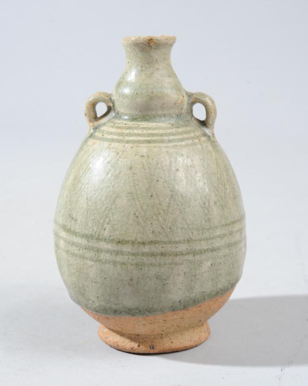15th Century Thai Celadon Gourd Vase: Sawankhalok vase with two small handles, the lower part with impressed cross hatch pattern between banded borders. Glaze stops short of base. Translucent grey-green glaze. Acquired in 1972. Approx. 4 