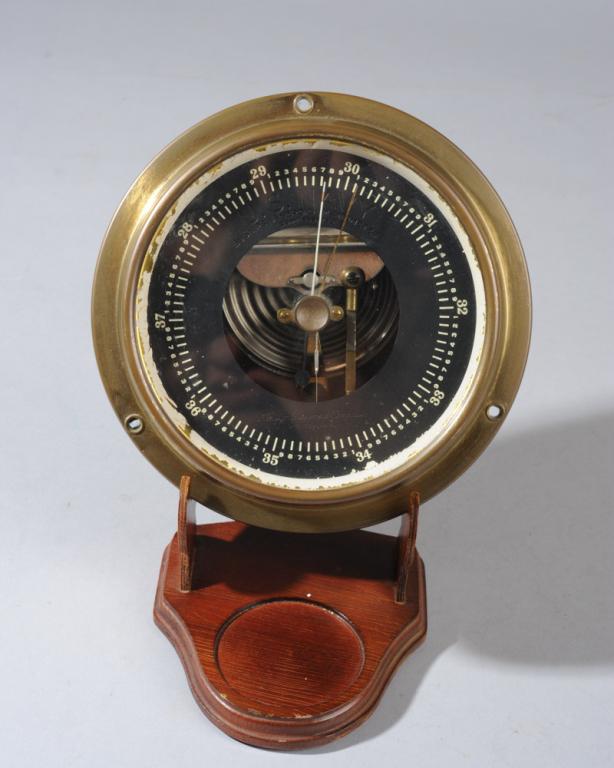 WWII U.S. Navy Submarine Aneroid Manometer: Taylor Instrument Companies (Rochester, New York), marked to face and back and dated 1944. In as-found condition.Dia: approx. 6 1/2".D: approx. 2 1/2".