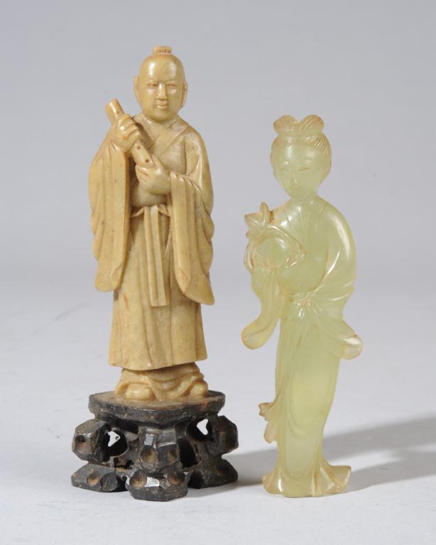 Chinese Carved Hardstone Guanyin, Monk: To include a carved hardstone figure of Guanyin, goddess of compassion, and a carved hardstone figure of a monk holding a flute (or similar object.) Guanyin figure, approx. 5" H.