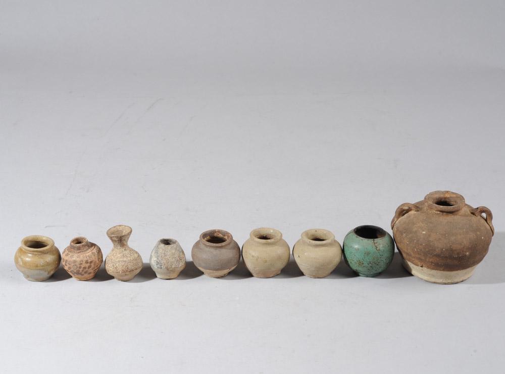 Lot Early Chinese Jarlets: Nine miniature ceramic vessels, various shapes and glazes, likely Song to Ming dynasty. Collected in Southeast Asia in the 1970s. Heights range from approx. 1 1/4" to 3".