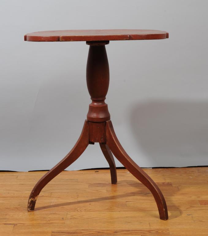 New England Federal Candlestand: The top rectangular with ovolo corners, supported by turned column terminating in tripod spider legs. Red wash finish. Minor damage / restoration to center of top. Likely origin Maine. Approx. 25" H, 