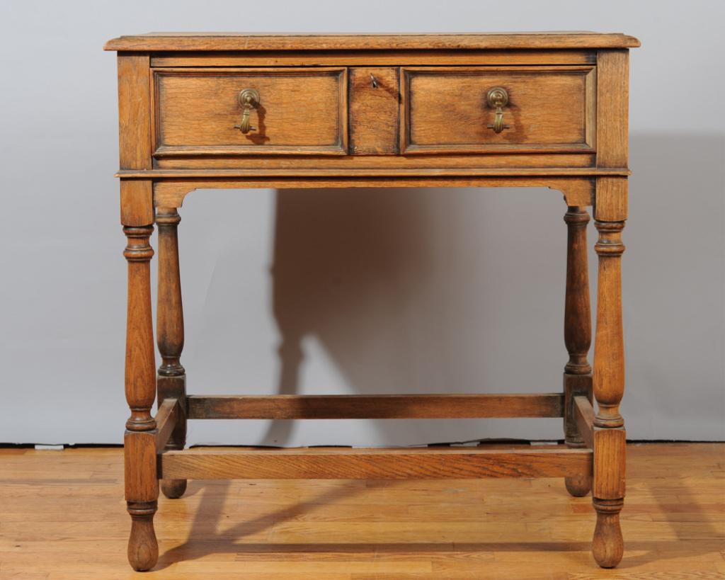 Vintage Silver Chest +: Vintage silver chest with molded edge top over dovetailed drawer (key included) with brass pulls, turned legs, with an assortment of silver plate and stainless flatware including Unity, Firths, and Ar