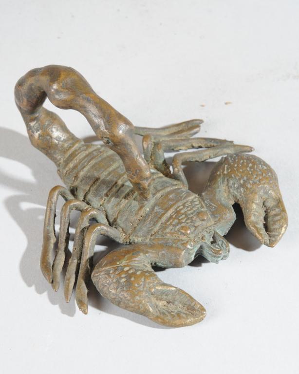 West African Bronze Scorpion Gold Weight: A very convincing scorpion, bronze, possibly a gold weight. Approx. 5" x 4 1/2" x 2 1/4". Provenance: Estate of Thomas McNemar, (1931-2020.) McNemar lived and collected throughout Central and West Afr
