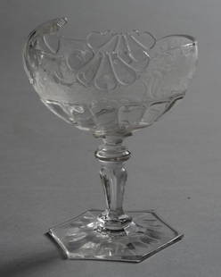 19th C. Lobmeyr Engraved Glass Pedestal Open Salt: The nautilus form bowl engraved with detailed hunting scenes, raised on faceted pedestal, the hexagonal base signed to underside with the J. & L. Lobmeyr (Vienna, Austria) engraved mark. Circa 1880. A